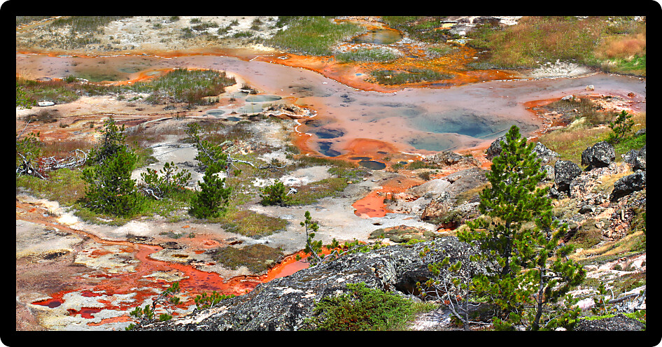 Beautiful colors of the Artist Paint Pots area in Yellowstone National Park Wyoming.