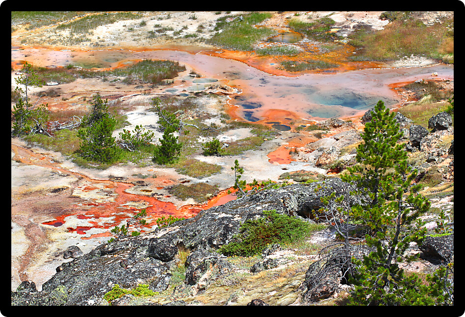 Beautiful colors of the Artist Paint Pots area in Yellowstone National Park Wyoming.