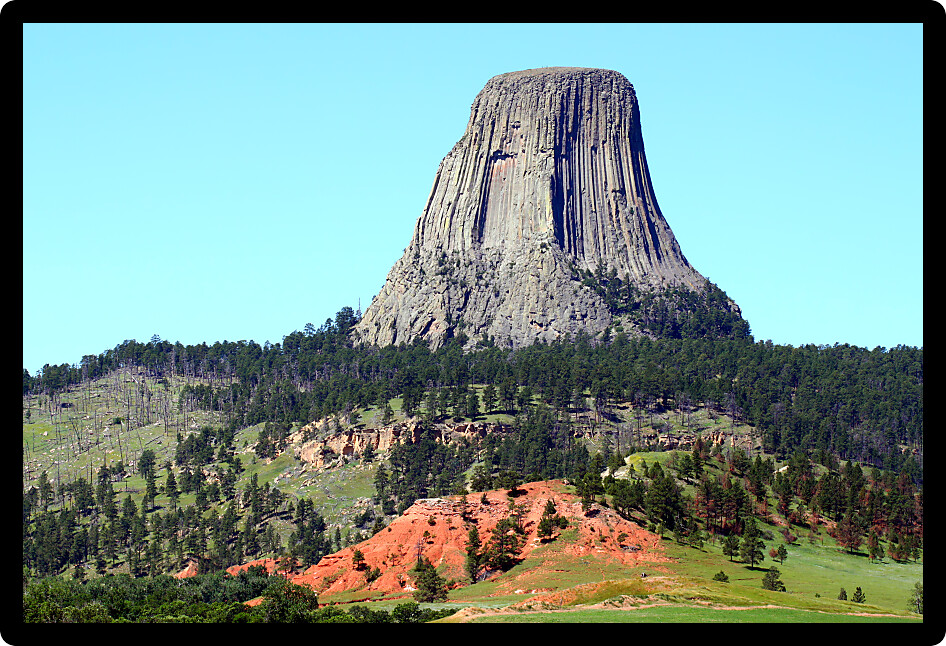 Devils Tower National Monument rises prominently from the landscape of northeastern Wyoming.