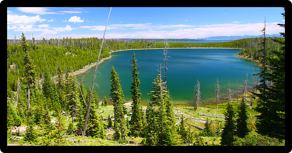 Beautiful blue waters Duck Lake in Yellowstone National Park of Wyoming.