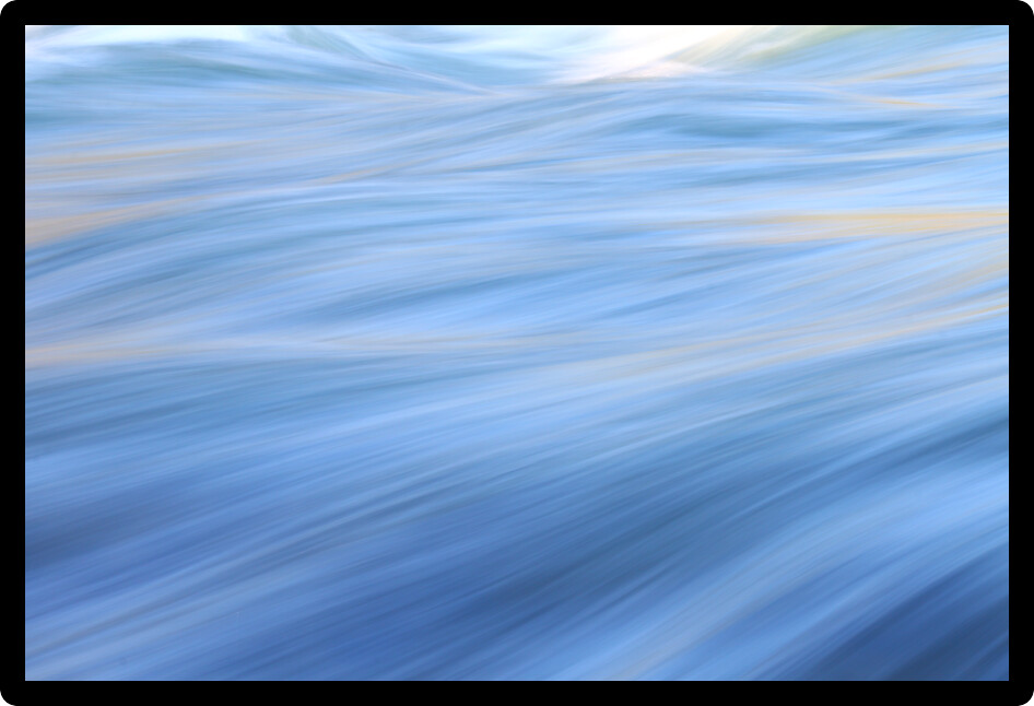 Vivid blue colors reflect off LeHardys Rapids of the Yellowstone River.