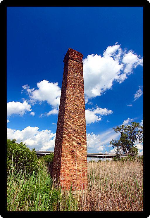 Overgrown brick tower at Keepataw Forest Preserve of Illinois.