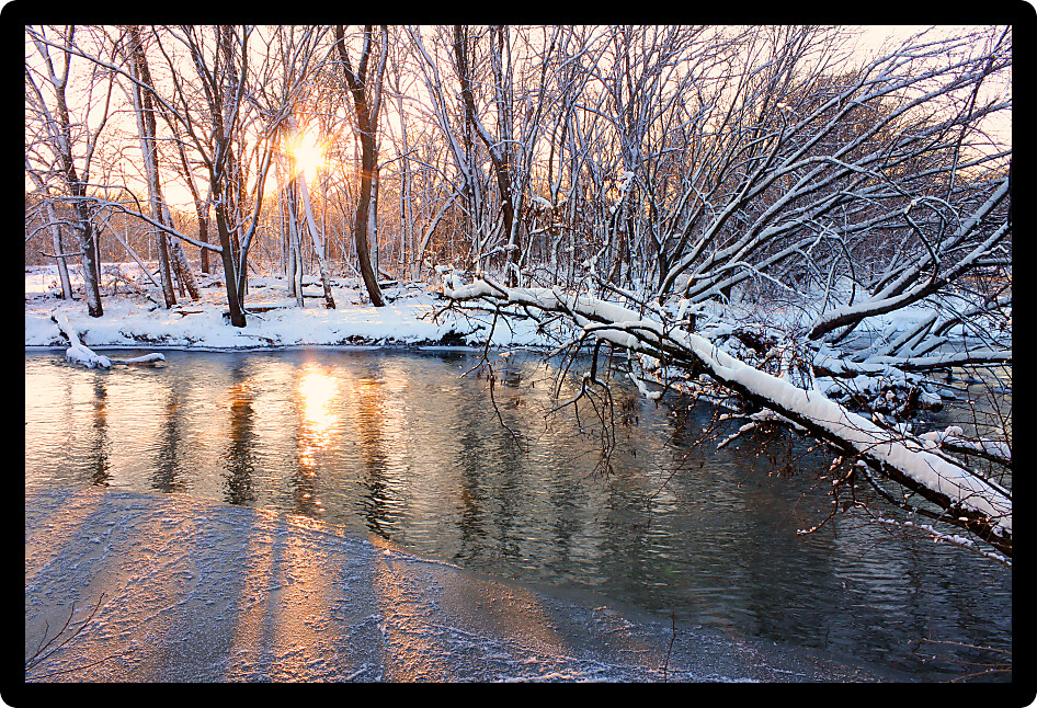 Light of sunset sparkles off the Kishwaukee River in northern Illinois.