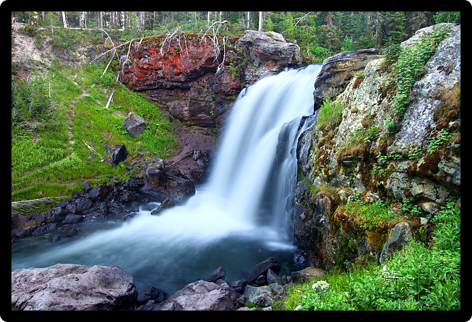 Beautiful Moose Falls in evening light at Yellowstone National Park in Wyoming.
