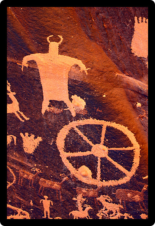 Petroglyphs seen on famous Newspaper Rock in Utah USA.