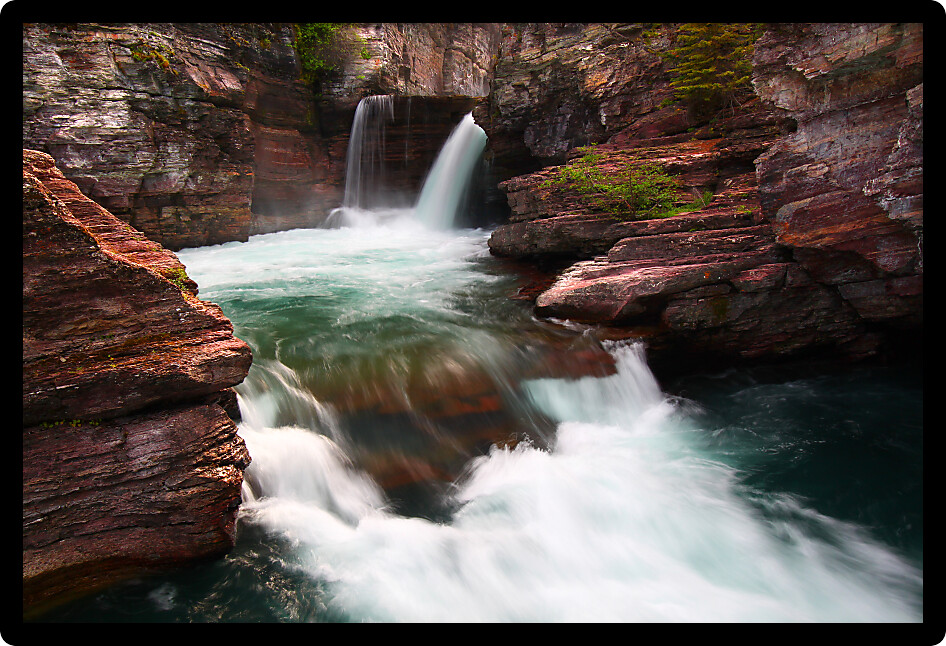 Turbulent waters of Saint Mary Falls at Glacier National Park Montana.