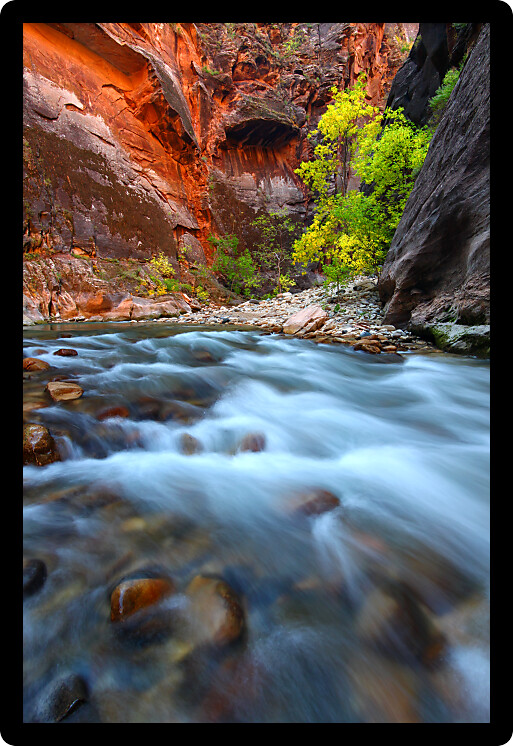 Smooth cascades of the Virgin River flow through The Narrows of Zion Canyon in Utah.