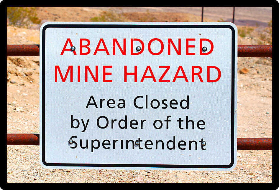 Sign warning of an Abandoned Mine Hazard in Death Valley National Park.