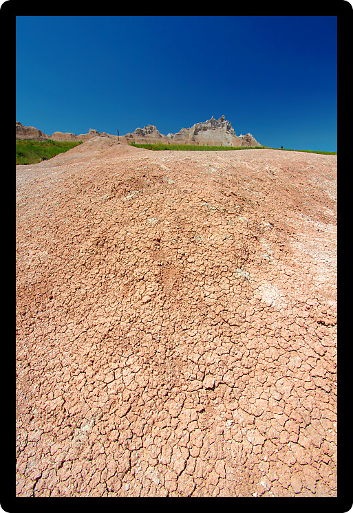 Parched substrate of Badlands National Park on a hot summer day.