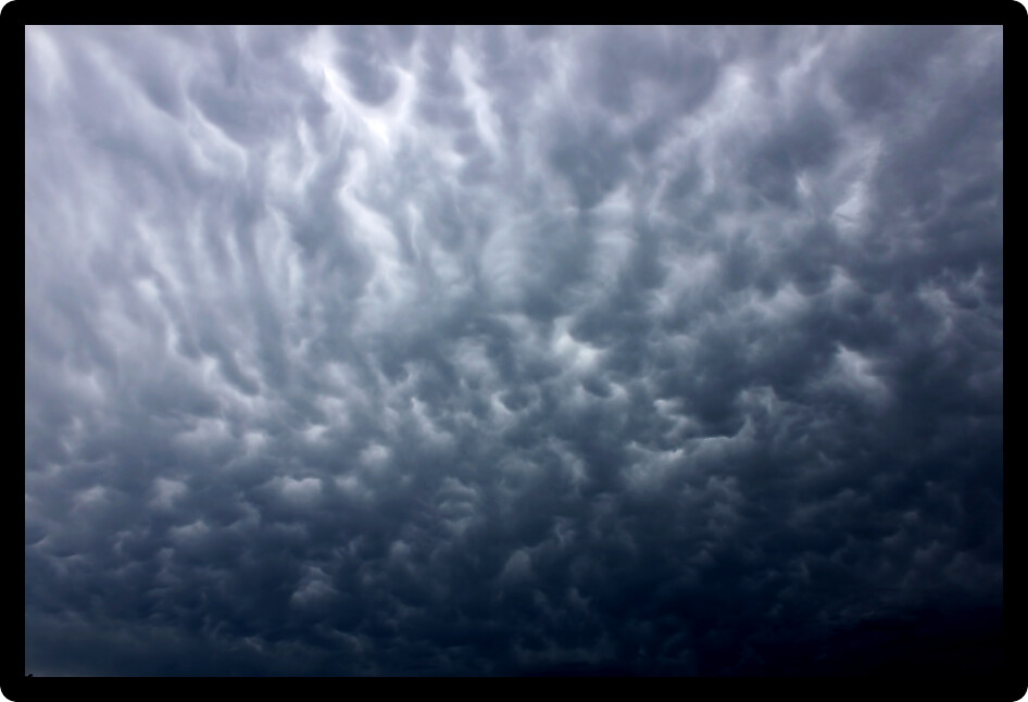 Ominous clouds precede the strong winds of a thunderstorm over Illinois.