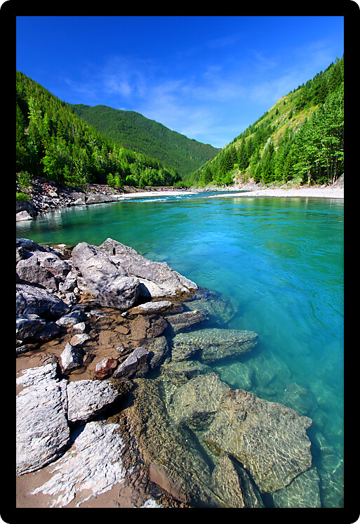 Bright turquoise waters of the Middle Fork Flathead River in the Flathead National Forest of Montana.