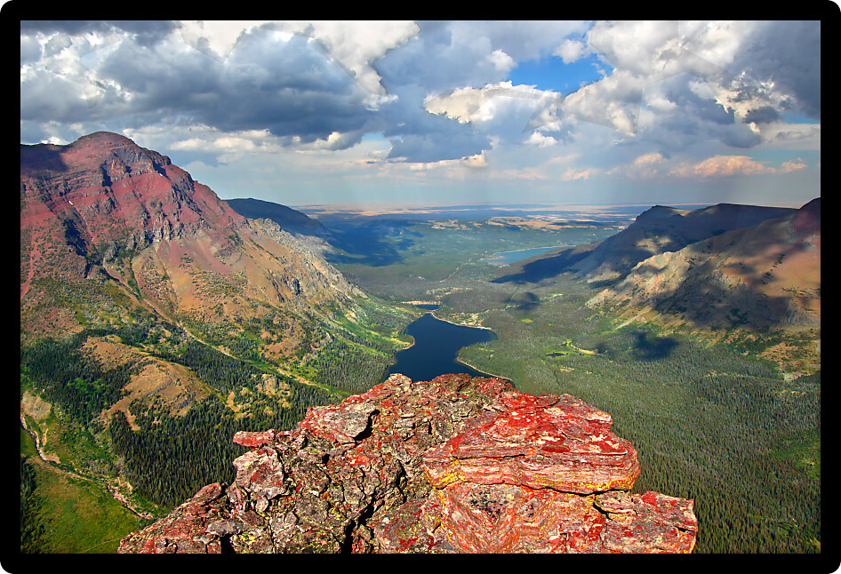 Mountaintop view of rugged alpine scenery in Glacier National Park.