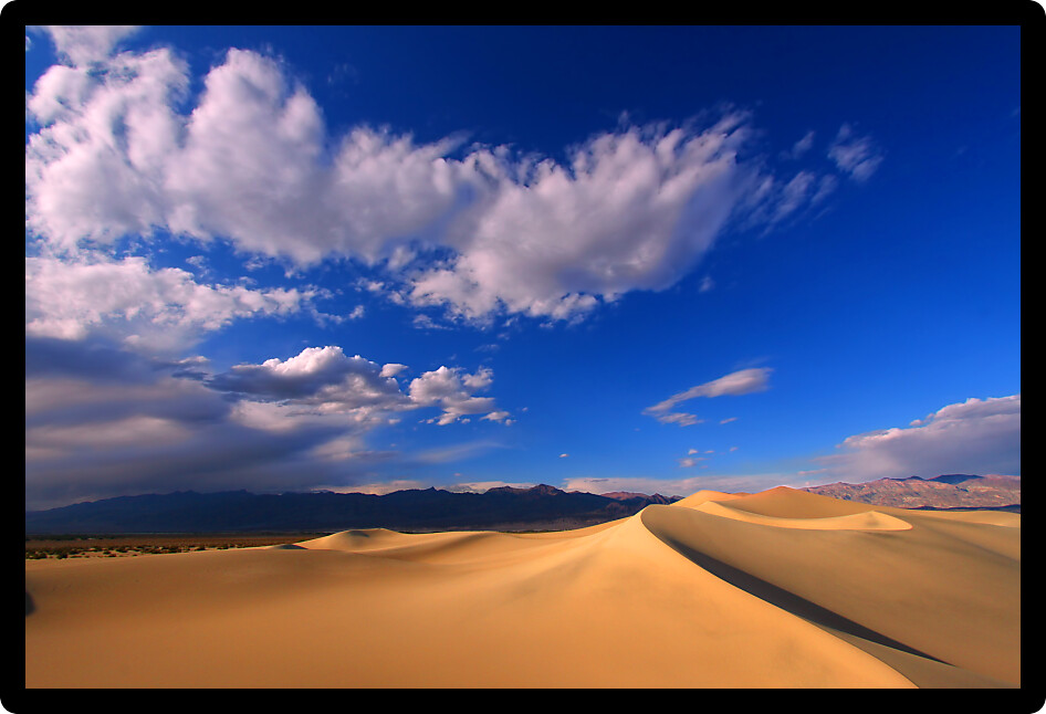 Dark blue skies over the Mesquite Flat Sand Dunes of Death Valley National Park.