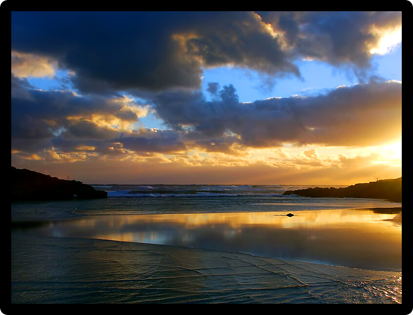Awesome sunset where the Merri River empties into the sea at Warrnambool Australia.